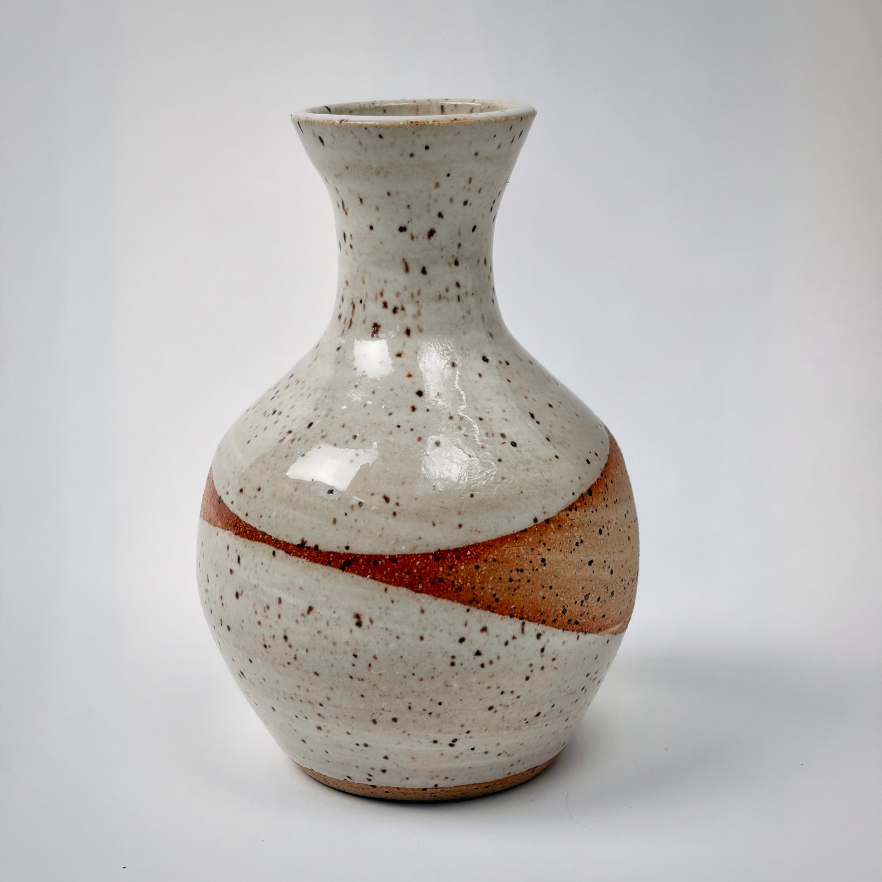 Speckled white bottle vase